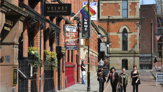 MANCHESTER, UK - APRIL 23: People visit famous Gay Village on April 23, 2013 in Manchester, UK. Gay Village is one of oldest and largest LGBT related communities in Europe.