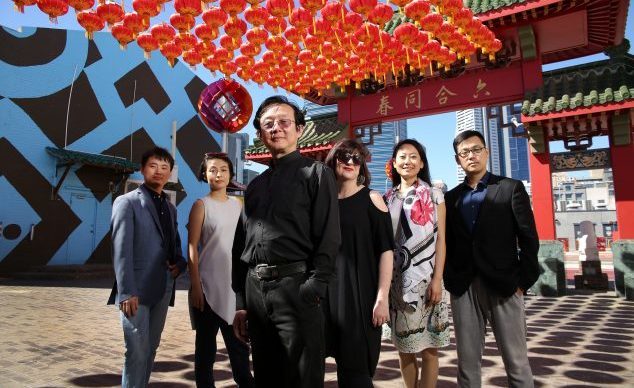 Artistic crew behind the Black Swan Theatre Company's collaboration with National Theatre of China director Dr Wang Xiaoying (centre). L-R Tao Chen (Asst Dtr), Felix Ching Ching Ho (Asst Dtr), Dr Wang, Kate Cherry (Artistic Dtr BSTC), Zhao Yan (Costumes), Zhang Huaxiang (Masks & Props). Photographed at Chinatown, Northbridge, Perth, WA; 4th February 2016. Photographed by Philip Gostelow.